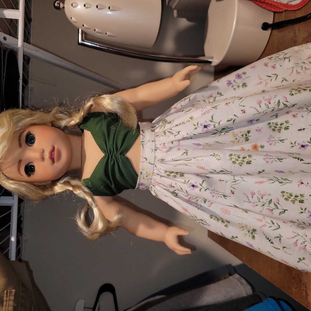 Green and White Doll with Blonde Hair and Fashion Accessories
